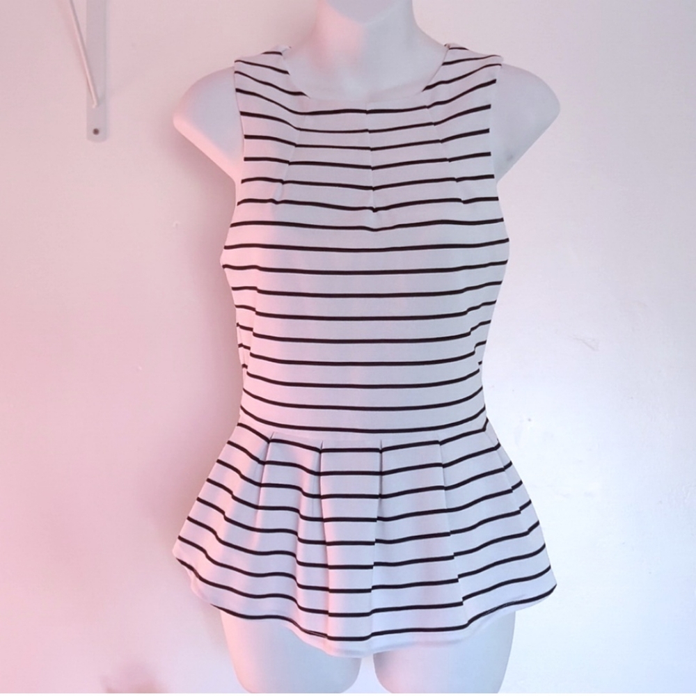 Flirty peplum zip back top